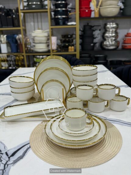 32pc White and Gold dinner set.