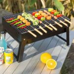 Foldable Portable barbecue charcoal grill.